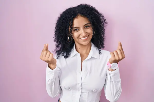 Hispanic Woman Curly Hair Standing Pink Background Doing Money Gesture — Stock Photo, Image