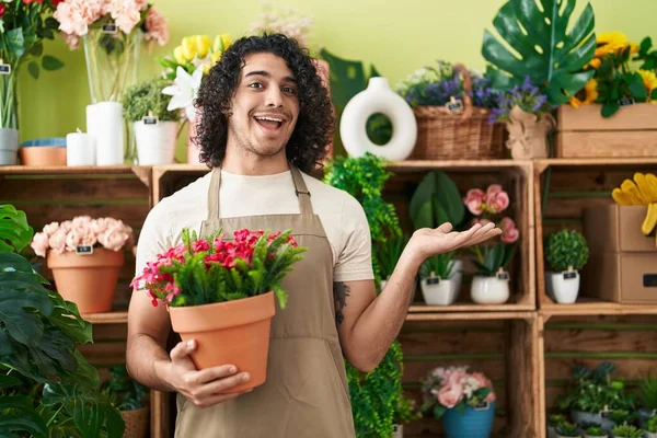 Hispanic Man Curly Hair Working Florist Shop Holding Plant Celebrating — Stock Photo, Image