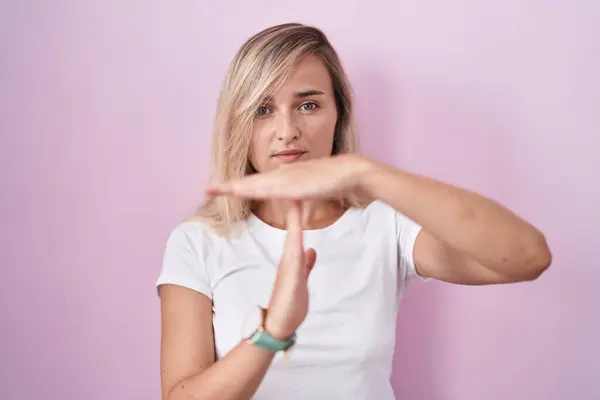 Young Blonde Woman Standing Pink Background Doing Time Out Gesture — Stock Photo, Image