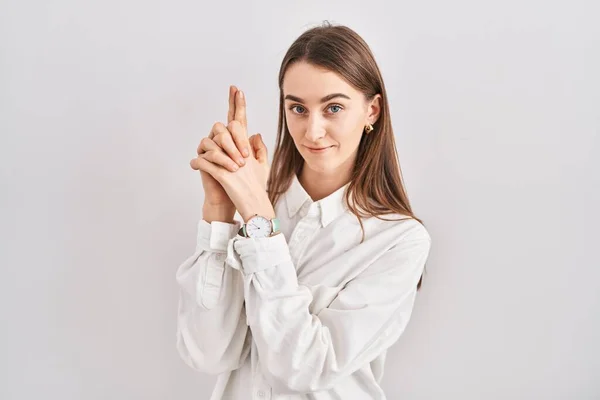 Young Caucasian Woman Standing Isolated Background Holding Symbolic Gun Hand — Stock Photo, Image