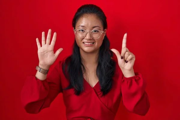 Asian Young Woman Standing Red Background Showing Pointing Fingers Number — Stock Photo, Image