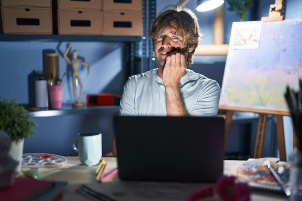 Middle Age Man Sitting Art Studio Laptop Night Looking Stressed — Stock Photo, Image