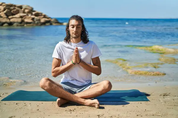 Young Hispanic Man Doing Yoga Exercise Sitting Sand Beach — Stock Photo, Image