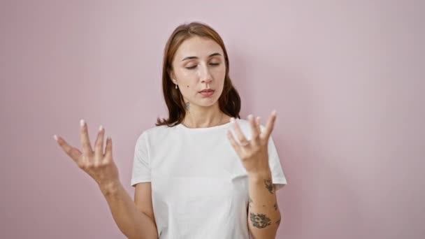 Young Woman Speaking Isolated Pink Background — Stock Video