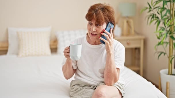Middle Age Woman Talking Smartphone Drinking Coffee Bedroom — Stok Video