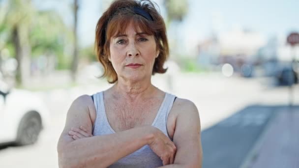Middle Age Woman Standing Serious Expression Arms Crossed Gesture Street — Stock Video
