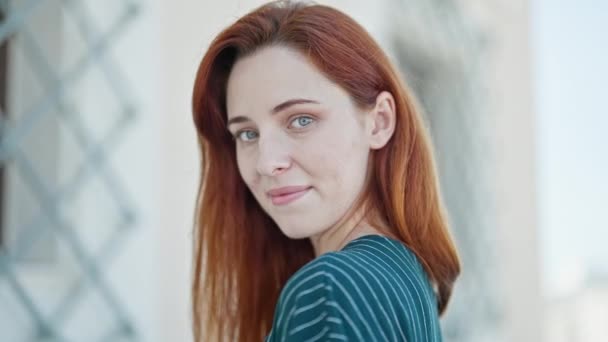 Young Redhead Woman Smiling Confident Walking Away Street — Stock Video