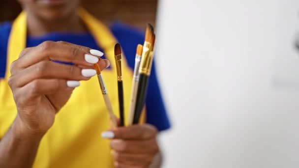 African American Woman Artist Holding Paintbrushes Art Studio — Stockvideo