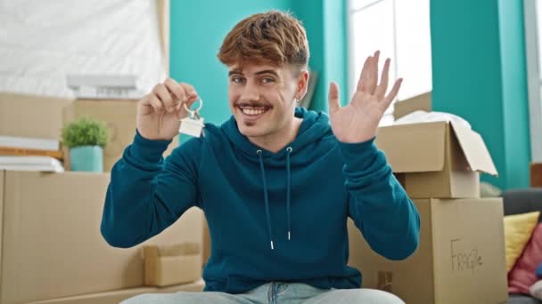 Young Hispanic Man Smiling Confident Holding New House Keys New — ストック動画