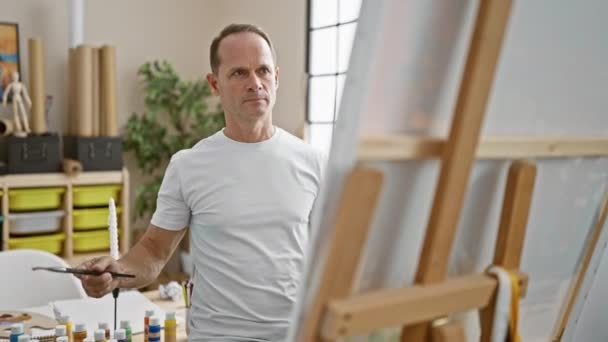 Confident Middle Age Man Smiling Artist Thoroughly Enjoys Drawing His — Stock Video
