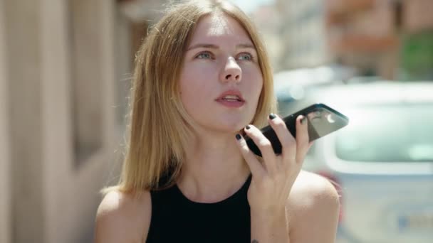 Young Blonde Woman Sending Voice Message Smartphone Street — Vídeos de Stock