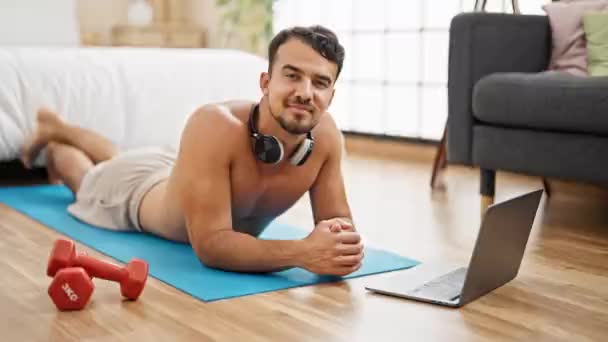 Young Hispanic Man Smiling Confident Lying Yoga Mat Bedroom — Stock Video