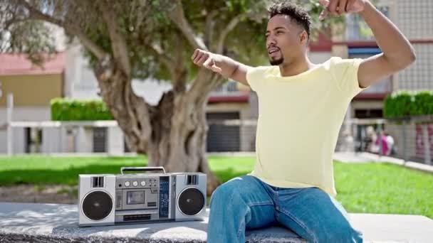 African American Man Listening Music Boombox Dancing Park — Stock Video