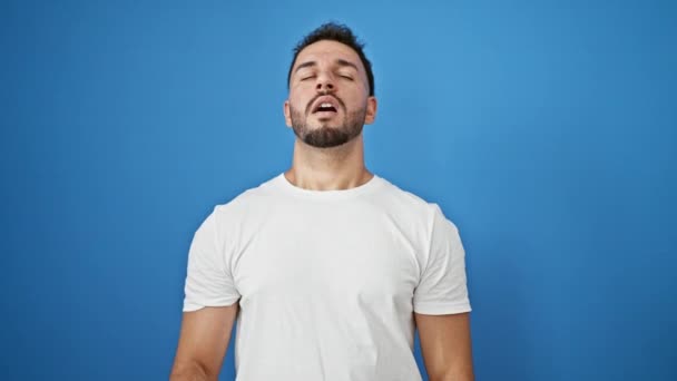 Young Arab Man Sneezing Isolated Blue Background — Stock Video