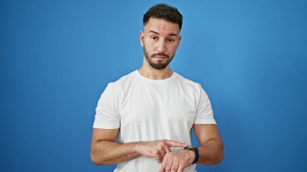 Young Arab Man Pointing Watch Saying Head Isolated Blue Background — Stock Video