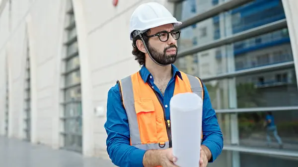 Young Hispanic Man Architect Holding Blueprints Looking Construction Place — Stock Photo, Image