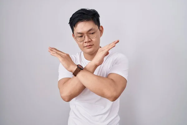 Young Asian Man Standing White Background Rejection Expression Crossing Arms — Stock Photo, Image