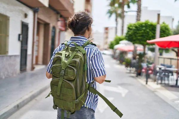 Young Hispanic Man Tourist Wearing Backpack Walking Street — Stok fotoğraf
