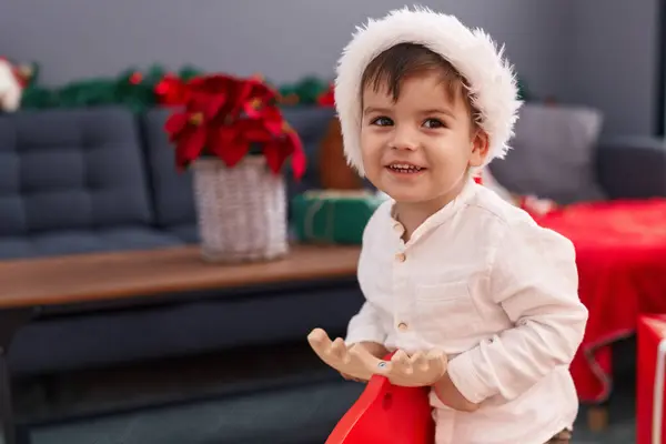 Adorable Hispanic Toddler Wearing Christmas Hat Playing Reindeer Rocking Home — Stock Photo, Image