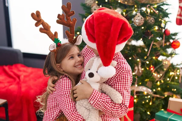 Brother Sister Hugging Each Other Standing Christmas Gifts Home — Stock Photo, Image