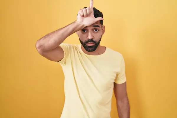 Hispanic Man Beard Standing Yellow Background Making Fun People Fingers — Stock Photo, Image