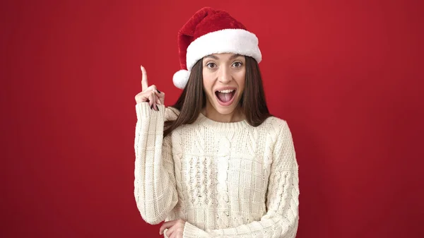 Νεαρή Όμορφη Ισπανόφωνη Γυναίκα Που Φοράει Χριστουγεννιάτικο Καπέλο Έκφραση Ιδέας — Φωτογραφία Αρχείου