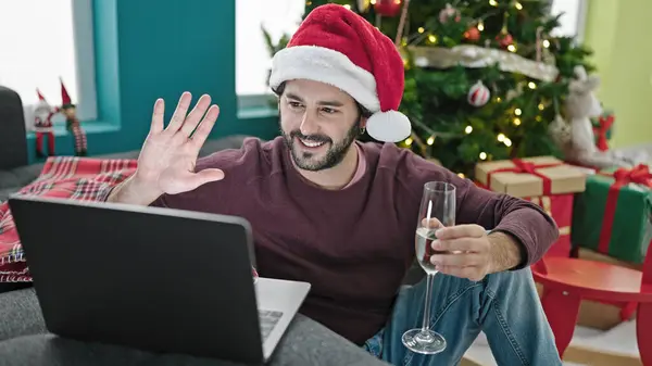 Young Hispanic Man Having Video Call Celebrating Christmas Champagne Home — Stock Photo, Image