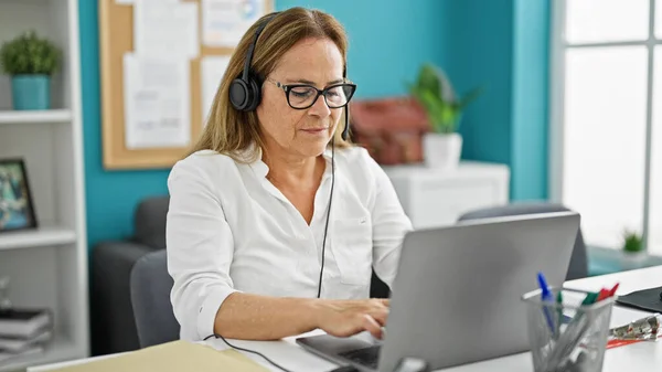 Middle Age Hispanic Woman Business Worker Opening Laptop Wearing Headphones — Stock Photo, Image