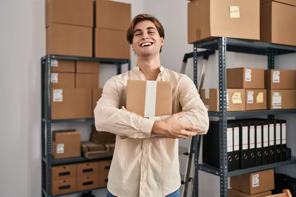 Young Caucasian Man Ecommerce Business Worker Hugging Package Office — Stockfoto