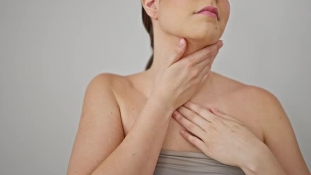 Young Beautiful Hispanic Woman Massaging Skin Neck Isolated White Background — Stock Video