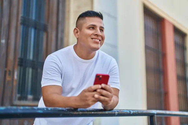 Young Latin Man Using Smartphone Leaning Balustrade Street — Stock Photo, Image