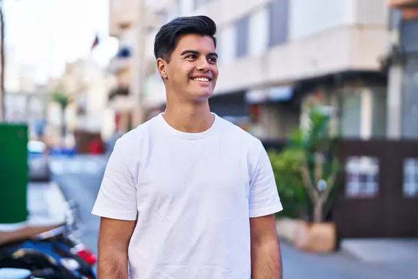 Young Hispanic Man Smiling Confident Looking Side Street —  Fotos de Stock