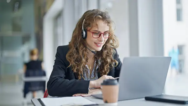 Young woman business worker having video call smiling at the office