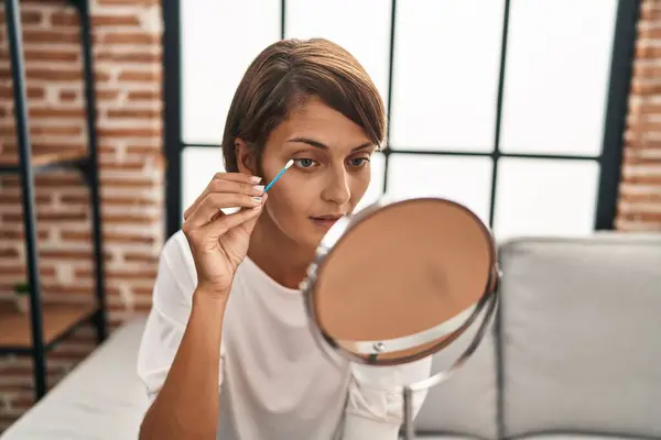 Young Beautiful Hispanic Woman Looking Mirror Using Cotton Stick Home — Photo