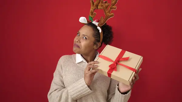 African American Woman Listening Sound Christmas Gift Wearing Reindeer Ears — Stock Photo, Image