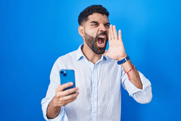 Hispanic Man Beard Using Smartphone Typing Message Shouting Screaming Loud — Stock Photo, Image