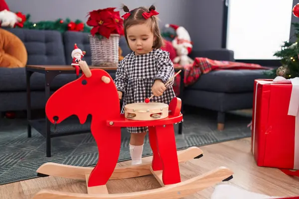 Adorable Chinese Toddler Playing Tambourine Standing Christmas Tree Home — Stock Photo, Image