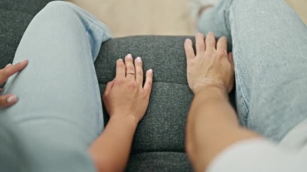 Man Woman Couple Sitting Sofa Hands Together Home — Video