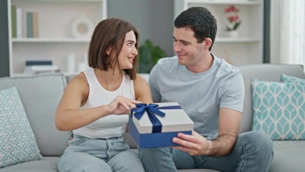 Beautiful Couple Sitting Sofa Surprise Birthday Gift Home — Stock Video