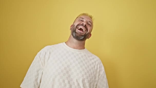 Young Man Laughing Lot Isolated Yellow Background — Stock Video