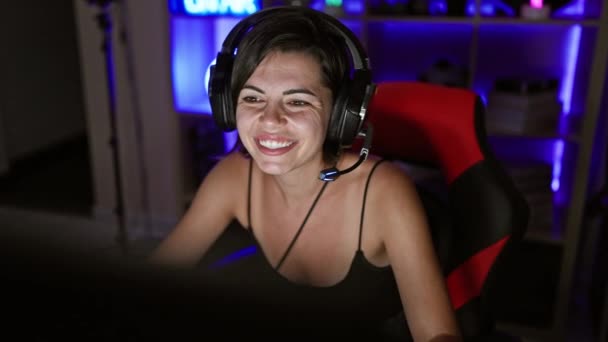 Victorious Young Hispanic Woman Beautiful Gamer Streamer Confidently Smiling She — Stock Video
