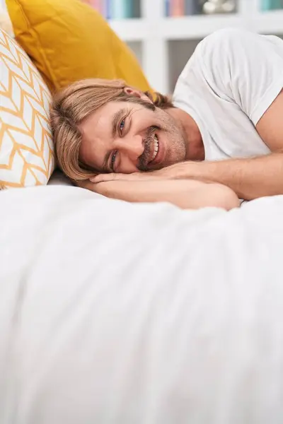 Young Blond Man Smiling Confident Lying Bed Bedroom — 图库照片
