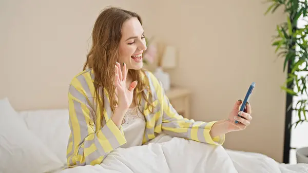 Young Blonde Woman Having Video Call Sitting Bed Bedroom — Zdjęcie stockowe
