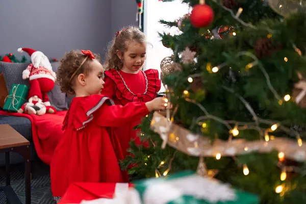 Adorable Girls Decorating Christmas Tree Home — Stock Photo, Image