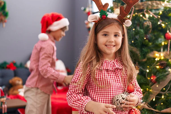 Brother Sister Holding Ball Decorating Christmas Tree Home — Stock Photo, Image