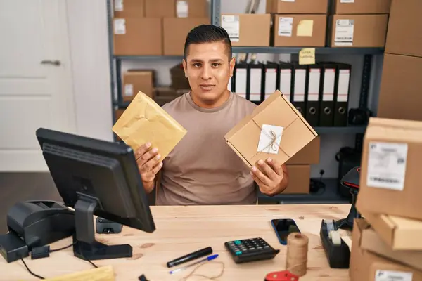 Hispanic Young Man Working Small Business Ecommerce Holding Packages Relaxed — Stock Photo, Image