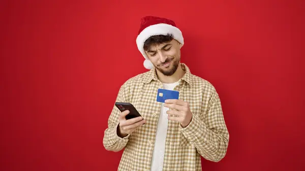 Junger Arabischer Mann Beim Weihnachts Online Shopping Mit Smartphone Vor — Stockfoto