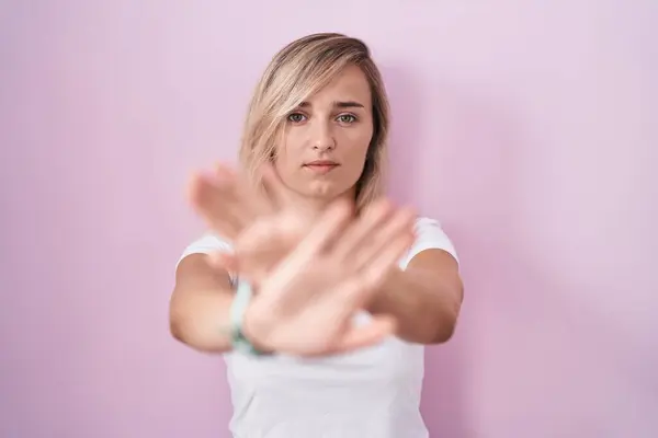 Young Blonde Woman Standing Pink Background Rejection Expression Crossing Arms — Stock Photo, Image