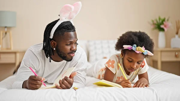 African American Father Daughter Wearing Funny Diadem Drawing Notebook Lying — Stock Photo, Image