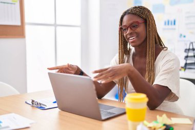 African american woman business worker having video call at office